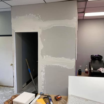 Commercial Wall Rebuild & Barn Door before